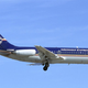 A Douglas DC-9-14 of Midwest Express Airlines arrives at Ronald Reagan Washington National Airport in 2002 (Sunil Gupta)